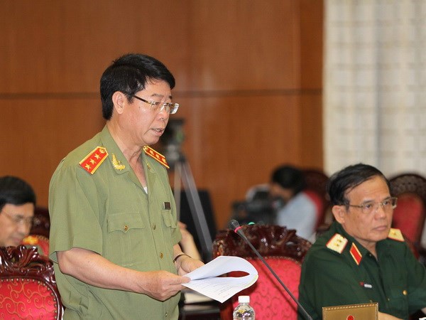 Thượng tướng Bùi Văn Nam, Thứ trưởng Bộ Công an phát biểu tại phiên họp. (Ảnh: Dương Giang/TTXVN)