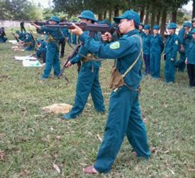 Lực lượng tự vệ cơ quan UBND huyện trong mùa huấn luyện 2014.