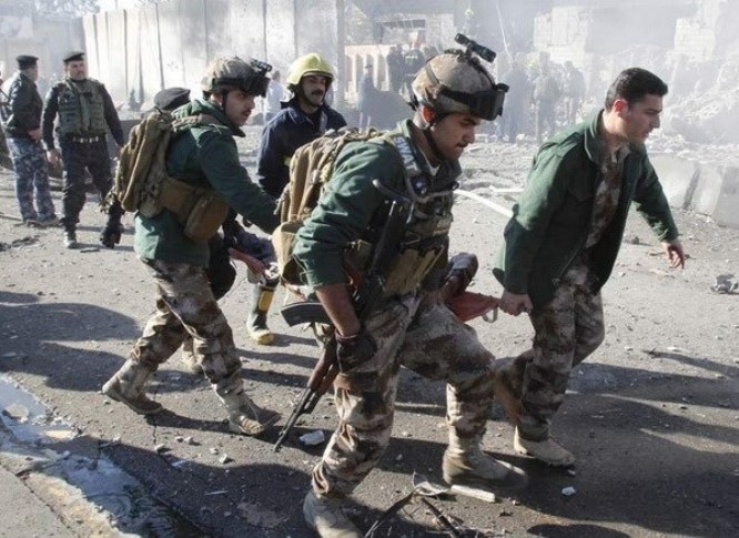 Hiện trường vụ đánh bom ở Kirkuk (Ảnh: Reuters)
