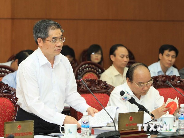 Thứ trưởng Bộ Tư pháp Đinh Trung Tụng phát biểu tại phiên họp. (Ảnh: An Đăng/TTXVN)