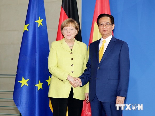 Thủ tướng Nguyễn Tấn Dũng và Thủ tướng Cộng hòa Liên bang Đức Angela Merkel tại cuộc họp báo. (Ảnh: Đức Tám/TTXVN)