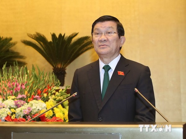 Chủ tịch nước Trương Tấn Sang trình bày Tờ trình trước Quốc hội. (Ảnh: Nhan Sáng/TTXVN)