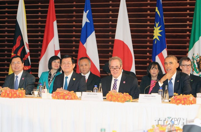 Chủ tịch nước Trương Tấn Sang dự Cuộc gặp Cấp cao Hiệp định Đối tác Kinh tế Chiến lược xuyên Thái Bình Dương (TPP) trong khuôn khổ Diễn đàn APEC. (Ảnh: Nguyễn Khang/TTXVN)