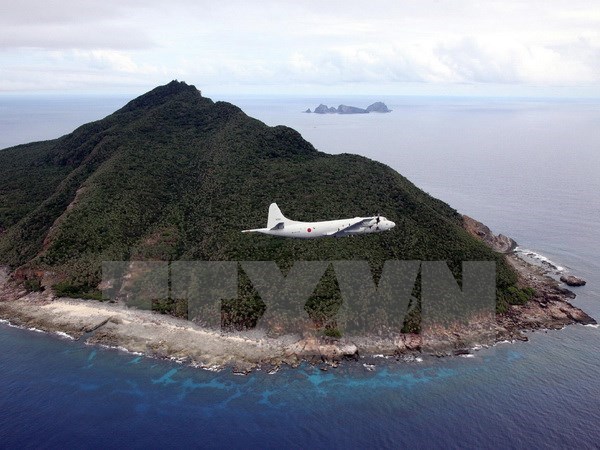 Máy bay chiến đấu của lực lượng phòng vệ biển Nhật Bản bay qua vùng ADIZ mà Trung Quốc tự công bố trên biển Hoa Đông. (Nguồn: AFP/TTXVN)