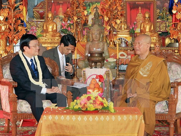 Chủ tịch nước Trương Tấn Sang đến thăm Đại Tăng Thống Bour Kry. (Ảnh: Nguyễn Khang/TTXVN)