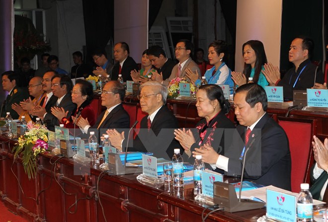 Tổng Bí thư Nguyễn Phú Trọng, Chủ tịch Quốc hội Nguyễn Sinh Hùng và các đại biểu tham gia Đoàn Chủ tịch Đại hội. (Ảnh: Trí Dũng/TTXVN)