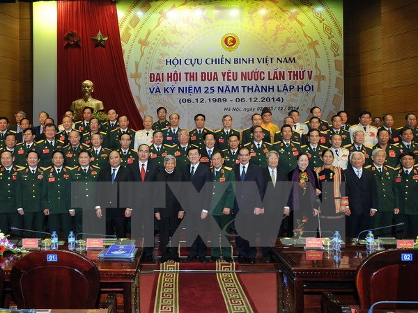 Chủ tịch nước Trương Tấn Sang và các đại biểu tại Đại hội Thi đua yêu nước lần thứ V-Hội cựu chiến binh Việt Nam. (Ảnh: Trọng Đức/TTXVN)
