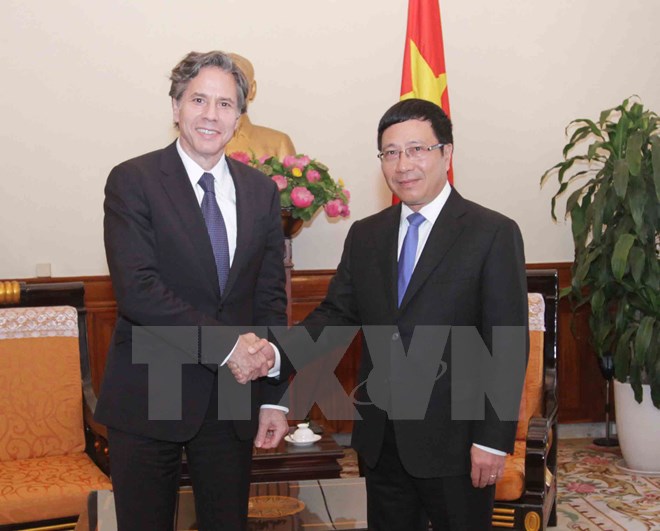 Phó Thủ tướng Phạm Bình Minh tiếp ngài Anthony Blinken thứ trưởng Bộ Ngoại giao Hoa Kỳ. (Ảnh: Phương Hoa/TTXVN)