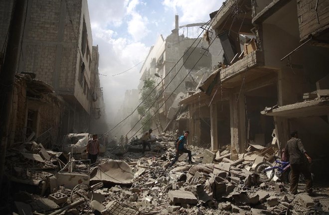Cuộc nội chiến ở Syria đã kéo dài suốt 4 năm qua, khiến quốc gia này trở nên kiệt quệ (Nguồn: AFP)