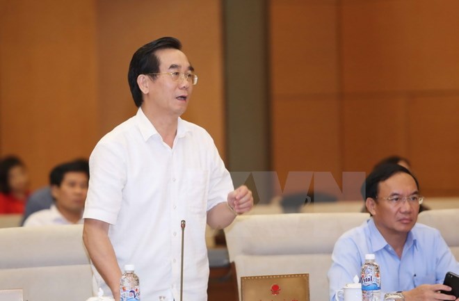 Ông Nguyễn Hữu Vạn, Tổng Kiểm toán Nhà nước trình bày tờ trình. (Ảnh: Phương Hoa/TTXVN)