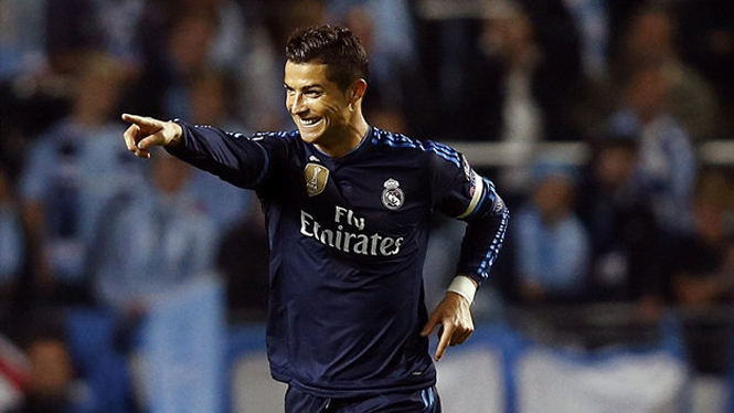 Niềm vui của Ronaldo sau khi mở tỉ số cho Real Madrid. Ảnh: Getty Images