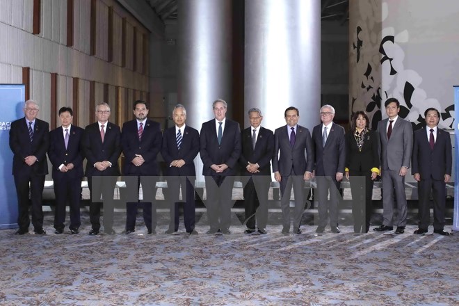 Trưởng đoàn các nước tham gia đàm phán TPP chụp ảnh chung tại hội nghị tại Atlanta ngày 1/10. (Nguồn: Reuters/TTXVN)