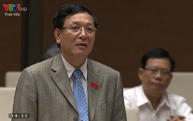 Ông Phạm Vũ Luận trả lời chất vấn tại Quốc hội (Ảnh chụp màn hình)