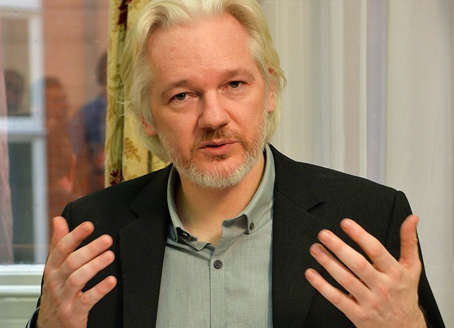 Người sáng lập WikiLeaks Julian Assange tại một cuộc họp báo của Đại sứ quán Ecuador ở trung tâm London ngày 18-8-2014. (Nguồn: Reuters)