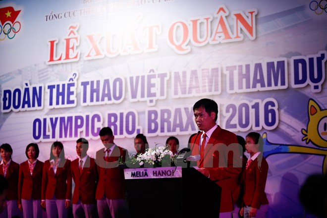 Trưởng đoàn Trần Đức Phấn tuyên bố quyết tâm trong lễ xuất quân của thể thao Việt Nam. (Ảnh: Minh Chiến/Vietnam+)