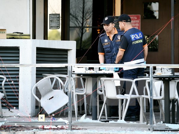 Cảnh sát Malaysia điều tra tại hiện trường một vụ tấn công. (Nguồn: AFP/TTXVN)