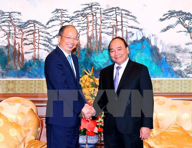 Thủ tướng Nguyễn Xuân Phúc tiếp Chủ tịch Ngân hàng Công Thương Trung Quốc, Dịch Hội Mãn. (Ảnh: Thống Nhất/TTXVN)