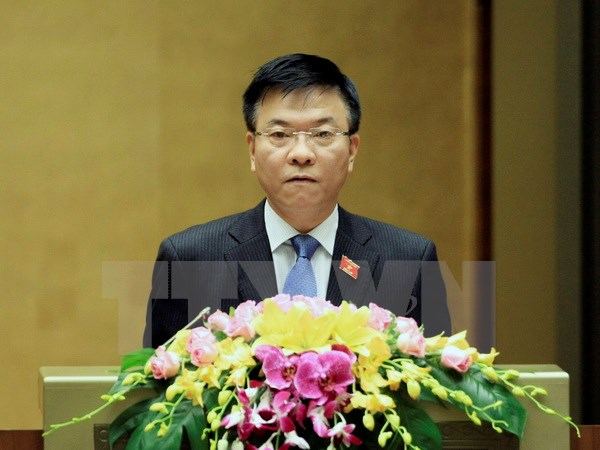 Bộ trưởng Tư pháp Lê Thành Long phát biểu ý kiến. (Ảnh: Phạm Kiên/TTXVN)