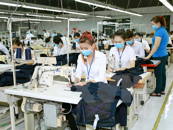 Hoạt động sản xuất tại Công ty TNHH Made Clothing Việt Nam, 100% vốn nước ngoài. (Ảnh: Hải Âu/TTXVN)