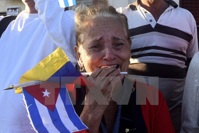 Người dân Cuba tiếc thương cố Lãnh tụ Fidel Castro. (Nguồn: AFP/TTXVN)