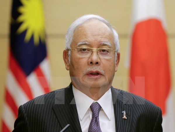 Thủ tướng Malaysia Najib Razak trong cuộc họp báo ở Tokyo ngày 16-11 vừa qua. (Ảnh: AFP/TTXVN)