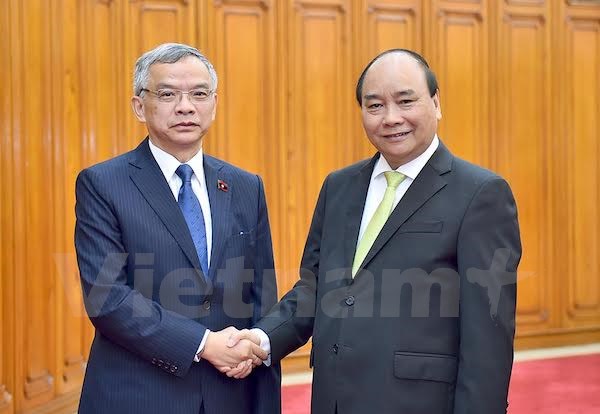 Thủ tướng Nguyễn Xuân Phúc tiếp Bộ trưởng Bộ Tài nguyên và Môi trường Lào Sommad Pholsena. (Nguồn: Cổng TTĐT Chính phủ)