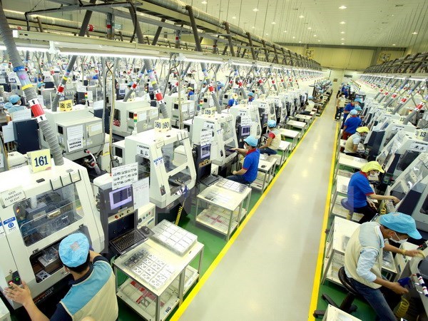  Dây chuyền sản xuất linh kiện điện tử tại Khu công nghiệp Điềm Thụy. (Ảnh: TTXVN)