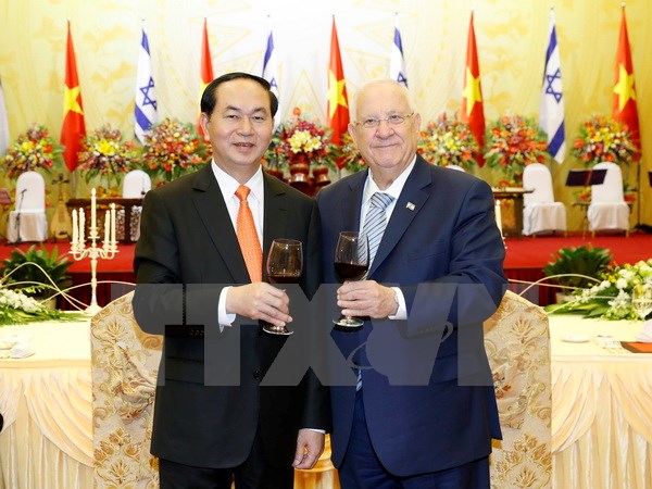 Chủ tịch nước Trần Đại Quang và Phu nhân mở tiệc chiêu đãi trọng thể Tổng thống Israel Reuven Ruvi Rivlin và Phu nhân đang thăm cấp Nhà nước Việt Nam. (Ảnh: Nhan Sáng/TTXVN)