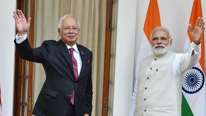 Thủ tướng Ấn Độ Narendra Modi và người đồng cấp Malaysia Najib Abdul Razak trước cuộc gặp. (Nguồn: PTI Photo)