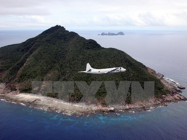 Máy bay chiến đấu của Lực lượng phòng vệ biển Nhật Bản bay qua vùng ADIZ mà Trung Quốc tự công bố trên biển Hoa Đông. (Nguồn: AFP/TTXVN phát)