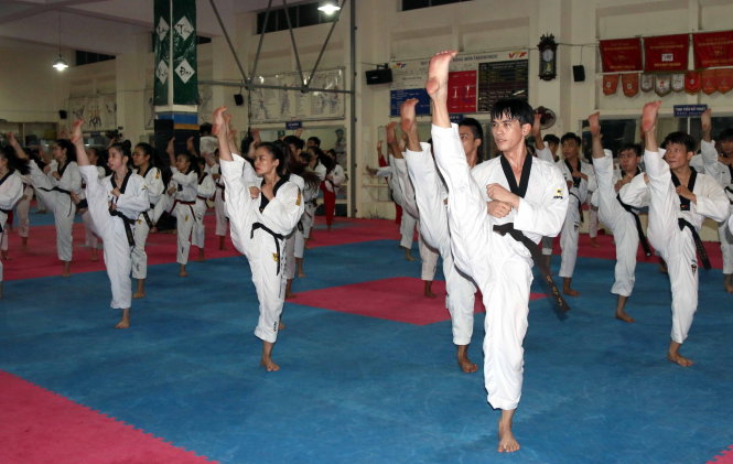  Một buổi tập luyện của đội tuyển quyền taekwondo VN. Ảnh: N.K