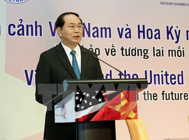 Chủ tịch nước Trần Đại Quang tới dự và phát biểu tại Hội thảo. (Ảnh: Nhan Sáng/TTXVN)