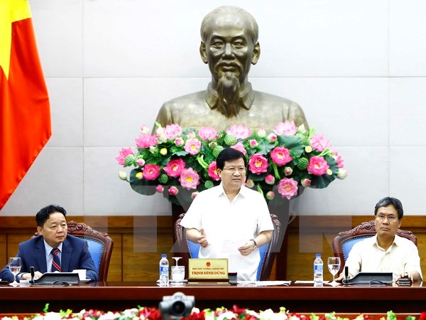 Phó Thủ tướng Trịnh Đình Dũng phát biểu tại buổi tiếp. (Ảnh: An Đăng/TTXVN)
