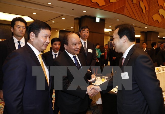 Thủ tướng Nguyễn Xuân Phúc trong buổi làm việc với các Doanh nghiệp Công nghệ thông tin Nhật Bản. (Ảnh: Thống Nhất/TTXVN)