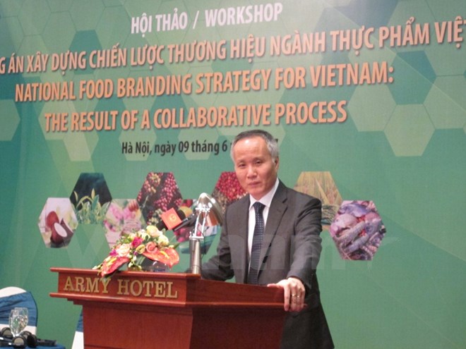 Thứ trưởng Trần Quốc Khánh phát biểu tại hôi thảo xây dựng chiến lược thương hiệu ngành thực phẩm. (Ảnh: Đức Duy/Vietnam+)