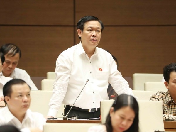 Phó Thủ tướng Vương Đình Huệ giải trình và làm rõ một số vấn đề Đại biểu Quốc hội nêu. (Ảnh: Phương Hoa/TTXVN)