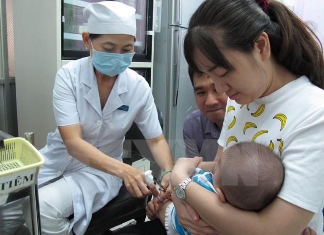 Trẻ tiêm vắcxin tại Trung tâm y tế dự phòng Thành phố Hồ Chí Minh. Ảnh minh họa. (Ảnh: Phương Vy/TTXVN)