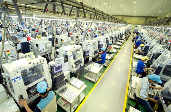Dây chuyền sản xuất linh kiện điện tử tại Công ty trách nhiệm hữu hạn Bokwang Vina (Khu công nghiệp Điềm Thụy). (Ảnh: Hoàng Hùng/TTXVN)