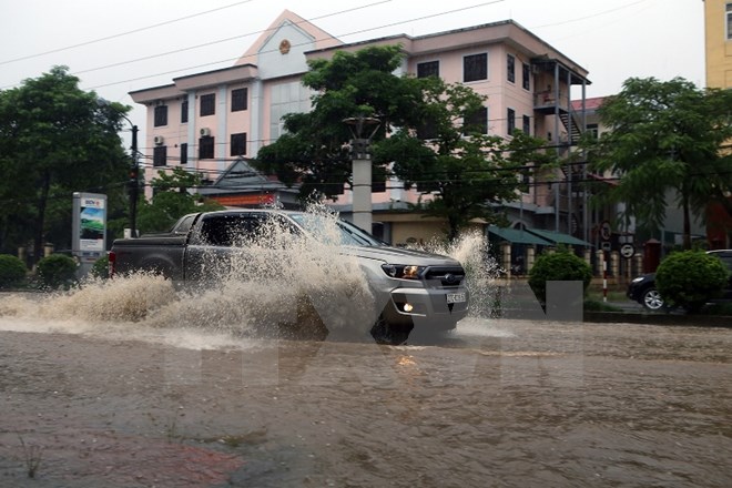 Mưa lớn gây ngập úng tại tỉnh Điện Biên ngày 14-8. (Ảnh: Tuấn Anh/TTXVN)