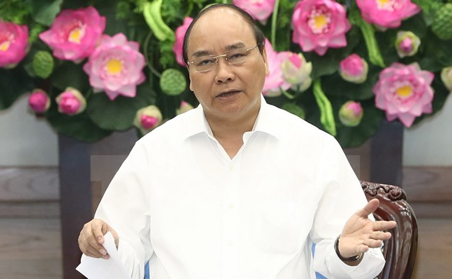Thủ tướng Nguyễn Xuân Phúc chủ trì phiên họp Chính phủ Thường kỳ tháng 8. (Ảnh: Thống Nhất/TTXVN)