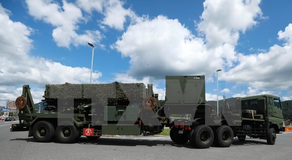 Tên lửa đất đối không PAC-3 được vận chuyển tới căn cứ quân sự ở Kaita, tỉnh Hiroshima. (Nguồn: AFP/TTXVN)