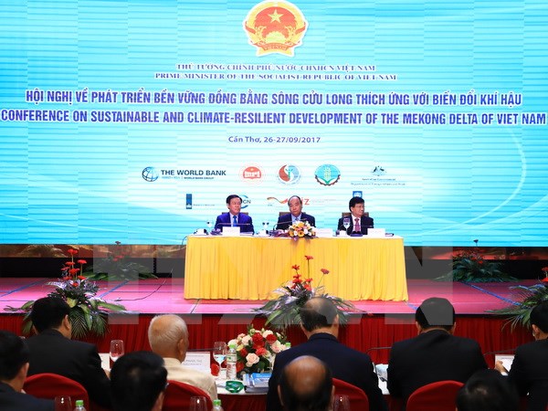 Thủ tướng Nguyễn Xuân Phúc dự Hội nghị về phát triển bền vững Đồng bằng sông Cửu Long thích ứng với biến đổi khí hậu. (Ảnh: Thống Nhất/TTXVN)