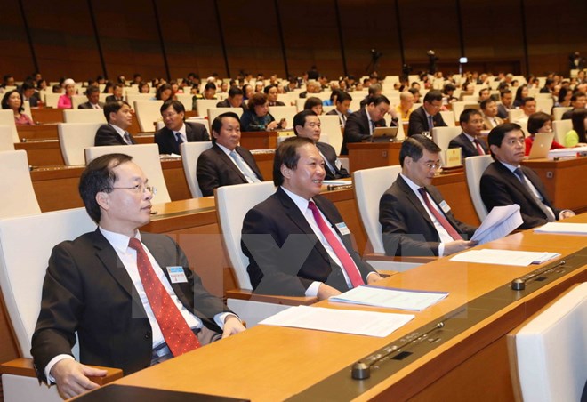 Các thành viên Chinh phủ tham dự Khai mạc kỳ họp. (Ảnh: Phương Hoa/TTXVN)