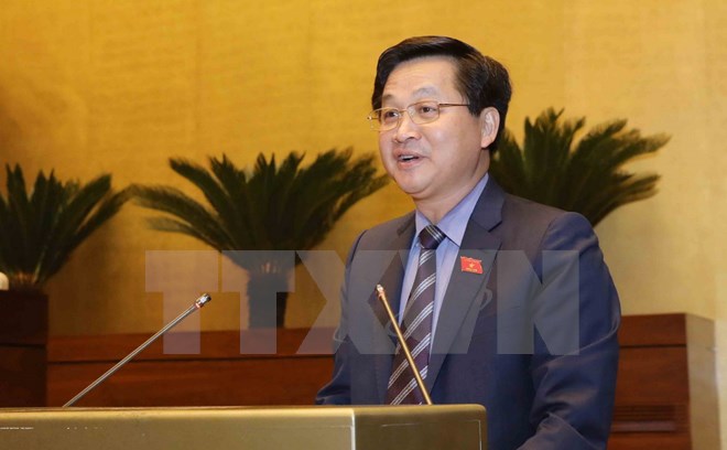 Tổng Thanh tra Chính phủ Lê Minh Khái trình bày Tờ trình về dự án Luật Phòng, chống tham nhũng (sửa đổi). (Ảnh: Phương Hoa/TTXVN)