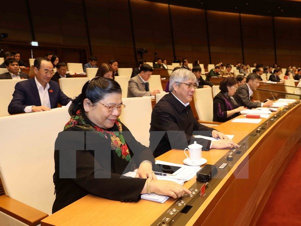 Đoàn đại biểu Quốc hội tỉnh Sơn La biểu quyết thông qua Luật Quy hoạch. (Ảnh: Phương Hoa/TTXVN)