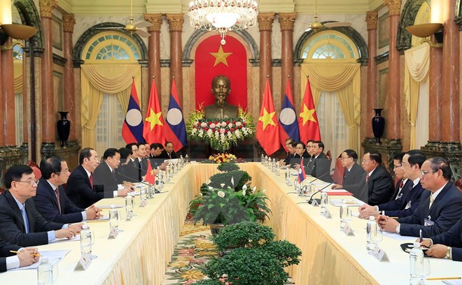 Chủ tịch nước Trần Đại Quang hội kiến với Tổng Bí thư, Chủ tịch nước Lào Bounnhang Vorachith. (Ảnh: Nhan Sáng/TTXVN)