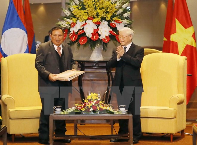 Tổng Bí thư Nguyễn Phú Trọng và Tổng Bí thư, Chủ tịch nước Lào Bounnhang Vorachith. (Nguồn: TTXVN)