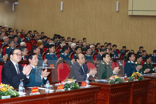 Thủ tướng Nguyễn Xuân Phúc và các đại biểu tham dự lễ míttinh. (Ảnh: Thống Nhất/TTXVN)
