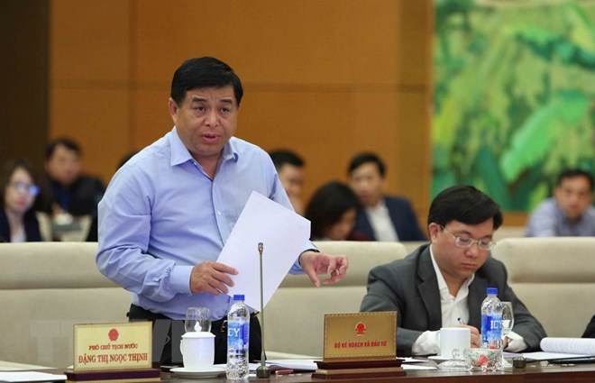 Bộ trưởng Bộ Kế hoạch và Đầu tư Nguyễn Chí Dũng phát biểu ý kiến. (Ảnh: Dương Giang/TTXVN)