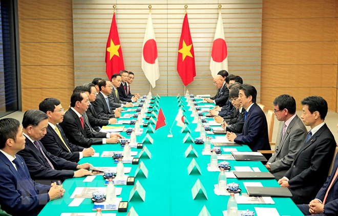Chủ tịch nước Trần Đại Quang hội đàm với Thủ tướng Nhật Bản Shinzo Abe. (Ảnh: Nhan Sáng/TTXVN)